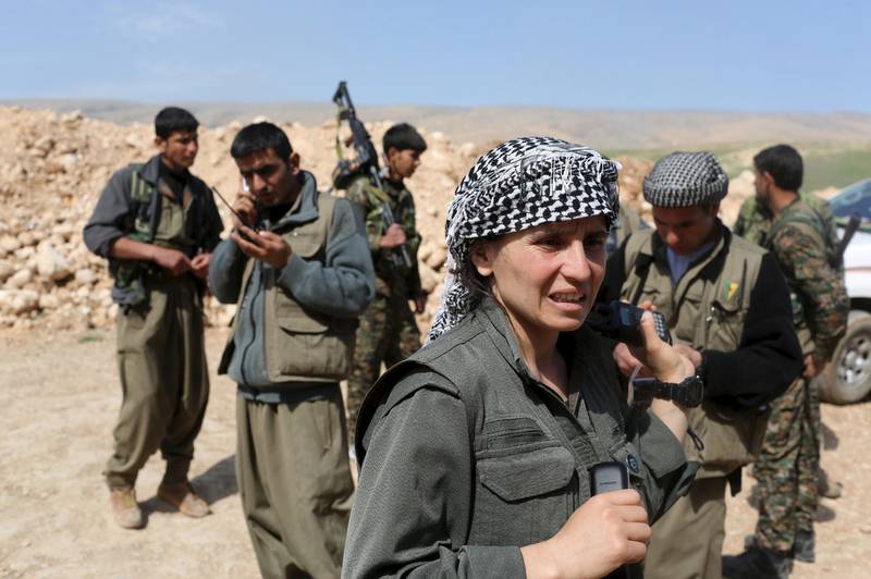 Kurdistan Workers Party (PKK) fighters are pictured in Sinjar, north-west Iraq, on March 11, 2015. Asmaa Waguih/Reuters



