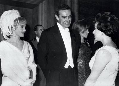 Actor Sean Connery and his wife American actress Diane Cilento are presented to Princess Margaret, 15 February 1965, during the Royal Film Performance of "Lord Jim". (Photo by - / AFP)