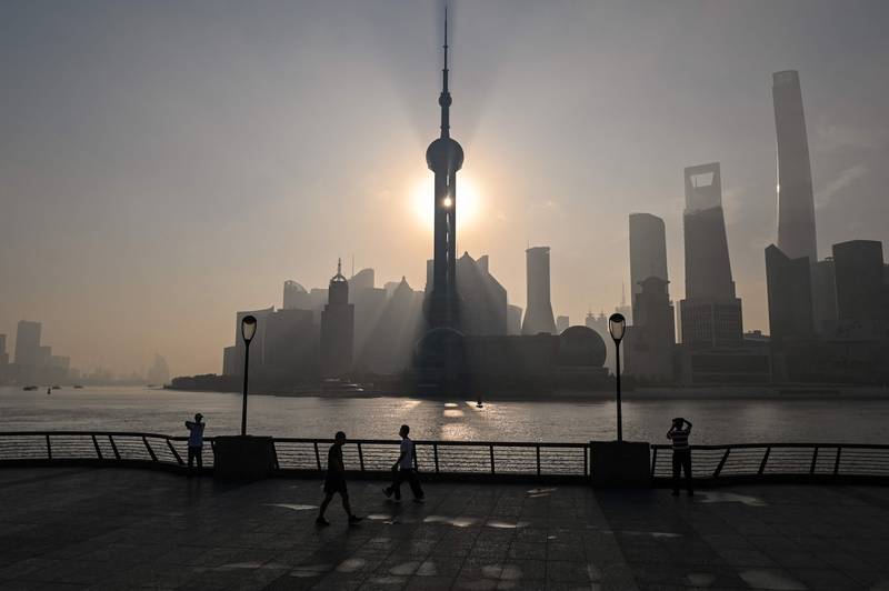 The financial district of Lujiazui during sunrise in Shanghai. AFP
