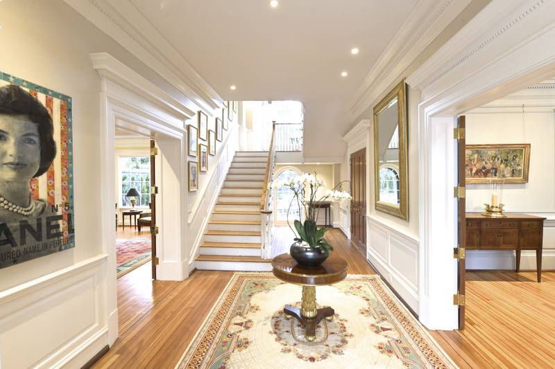 The entrance to the main house, which features a poster of its famous former resident. Photo: Sotheby’s International Realty