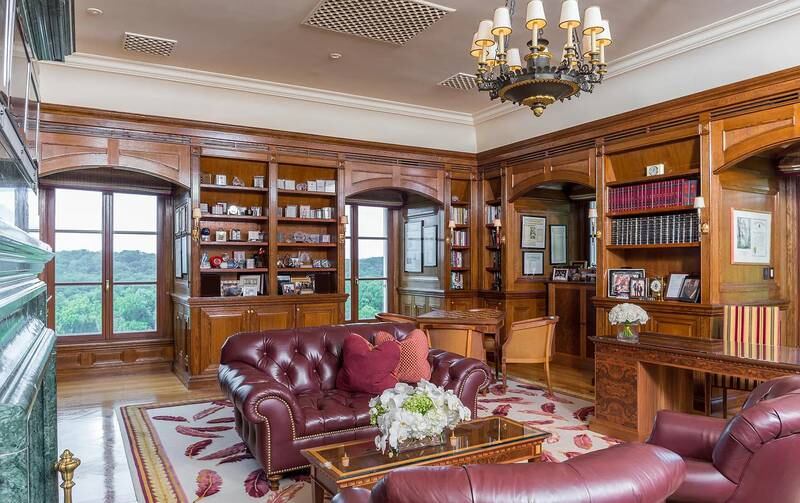 A bookshelf-lined study complements the main bedroom suite