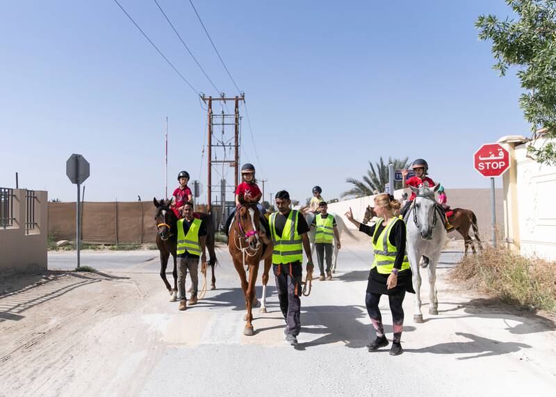 ABU DHABI, UNITED ARAB EMIRATES. 18 MARCH 2020.Children riding horses in Al Samha with Ride to Rescue project.Yasmin Sayyed runs Ride to Rescue. She has taken in 17 rescued horses who would normally be euthanized, and she tries to offset the cost of their care by offering the public healing sessions where they ride or walk with them. (Photo: Reem Mohammed/The National)Reporter:Section: