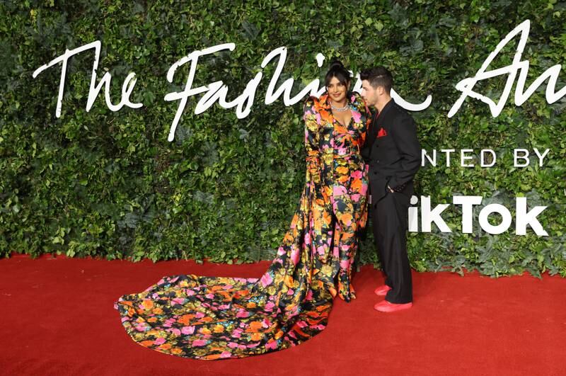 US singer Nick Jonas, seen here with his wife Priyanka Chopra at the Fashion Awards 2021,  will celebrate turning 30 in 2022. EPA