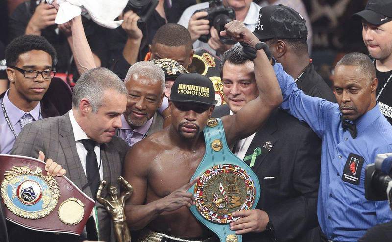 Floyd Mayweather is confirmed as the winner of his fight with Manny Pacquiao. Stringer / EPA