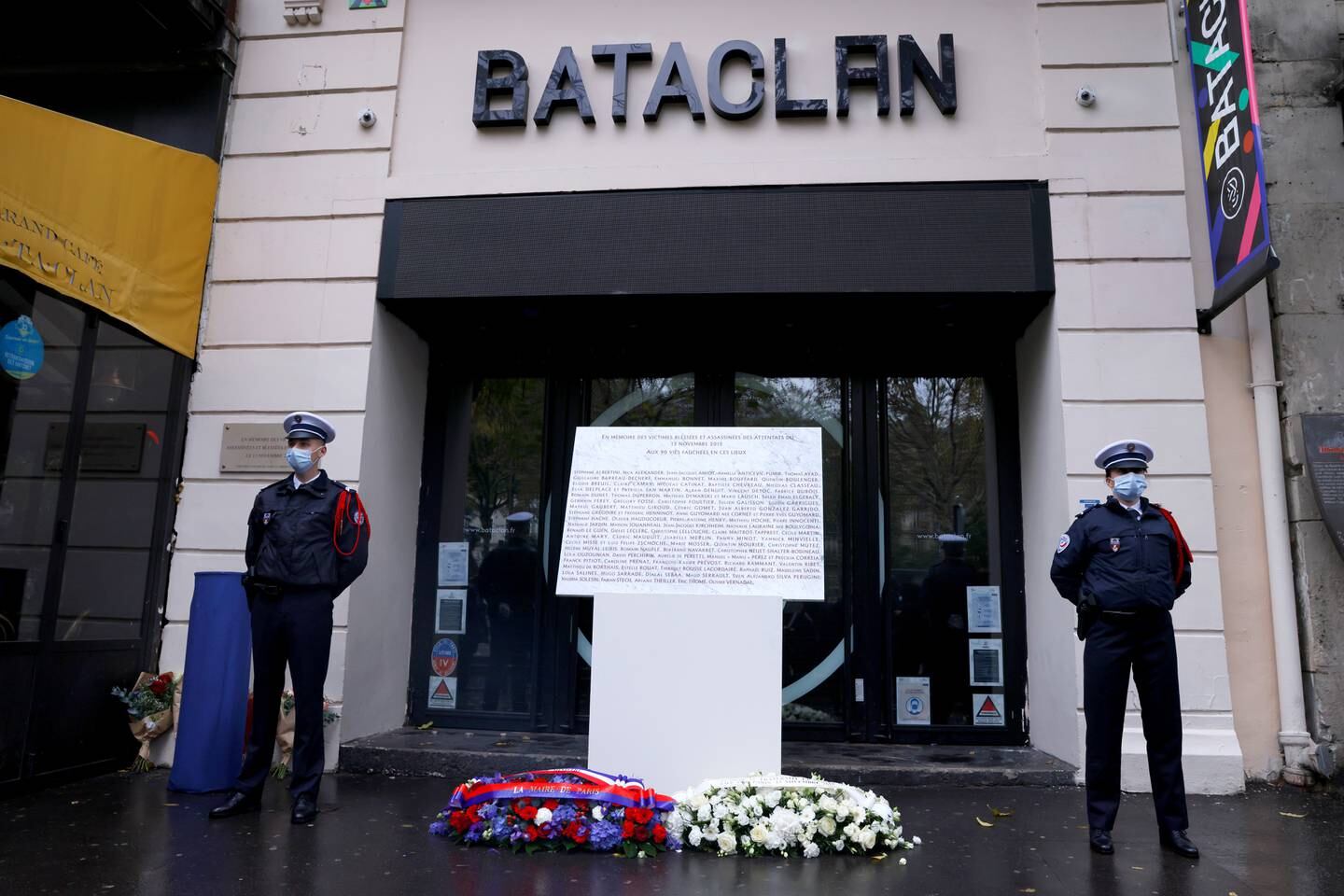 French policemen at the Bataclan concert hall during a ceremony to pay tribute to the victims of the terrorist attacks that killed 130 people. EPA