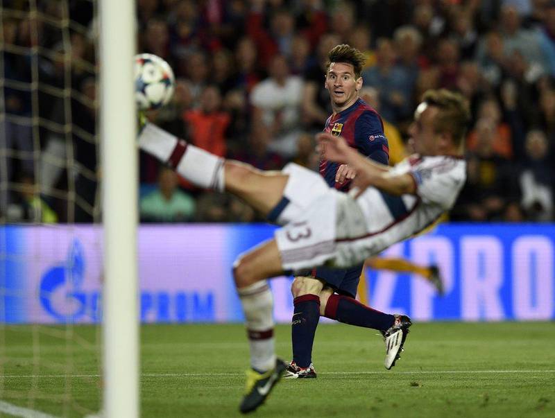 Barcelona's Lionel Messi scores the second goal against Bayern Munich on Wednesday to make it 2-0 in the Champions League semi-final first leg. Lluis Gene / AFP