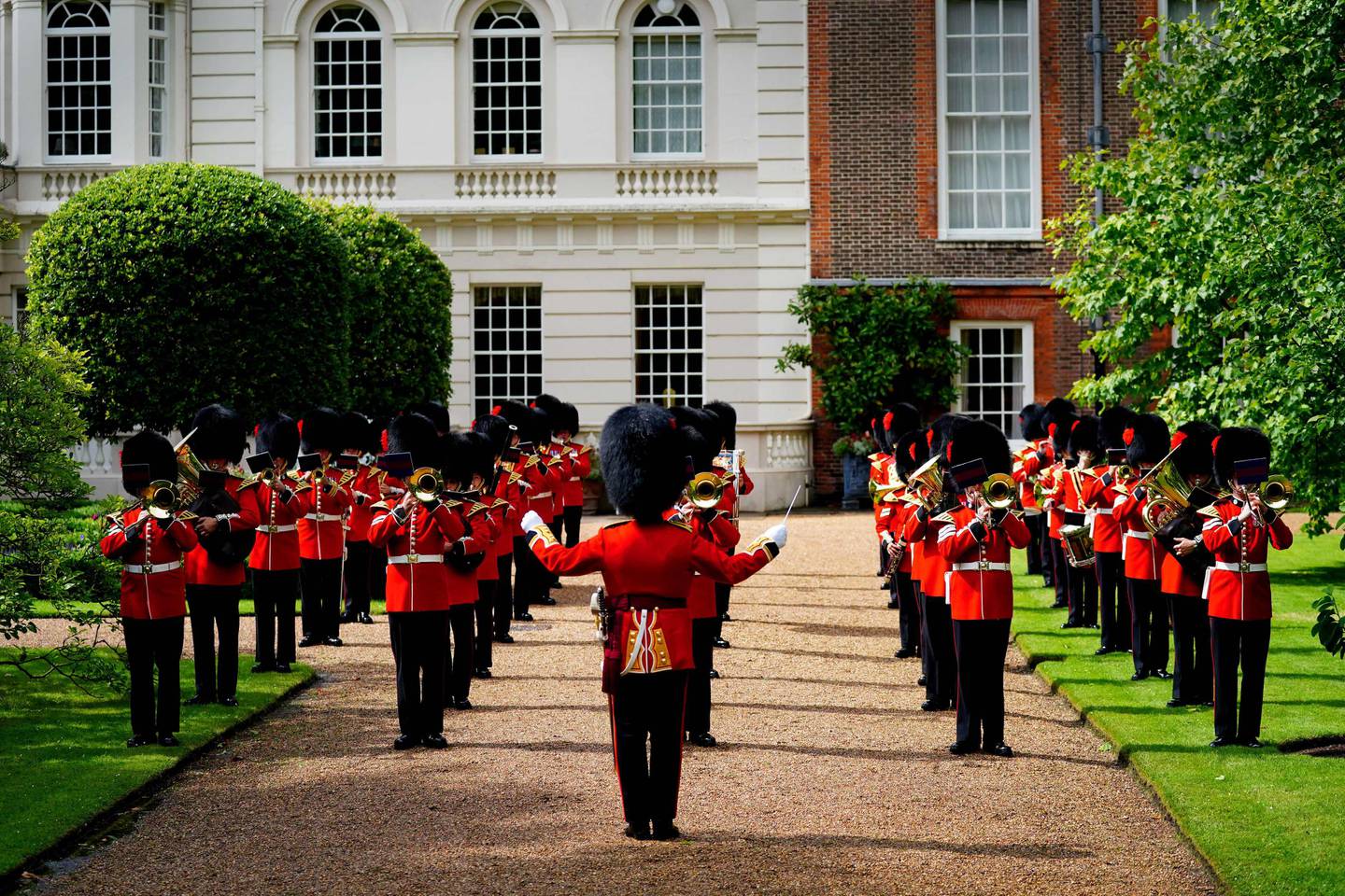The Band of the Coldstream Guards playing in the capacious gardens of Clarence House. AFP