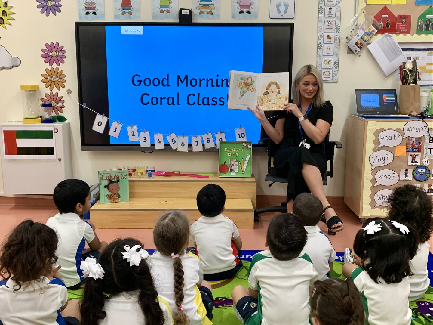 Bethany Austen, teacher at Brighton College Abu Dhabi, with her young students.  Photo: Bethany Austen