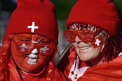 Swiss supporters await kick-off in the Women's World Cup second round soccer match between Switzerland and Spain at Eden Park in Auckland, New Zealand. Spain won by five goals to one. AP