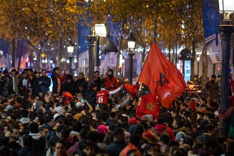 The Champs-Elysees in Paris rings with cheers from Moroccans. EPA