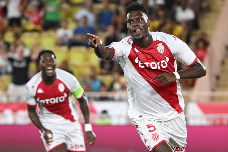 (FILES) In this file photo taken on September 11, 2022 Monaco's French defender Benoit Badiashile (R) celebrates scoring his team's first goal during the French L1 football match between AS Monaco and Olympique Lyonnais at the Louis II Stadium (Stade Louis II) in the Principality of Monaco.  - Chelsea signed France international defender Benoit Badiashile from Ligue 1 side Monaco on Thursday, January 5, for a fee believed to be just under 40 million euros ($42 million).  (Photo by CHRISTOPHE SIMON  /  AFP)