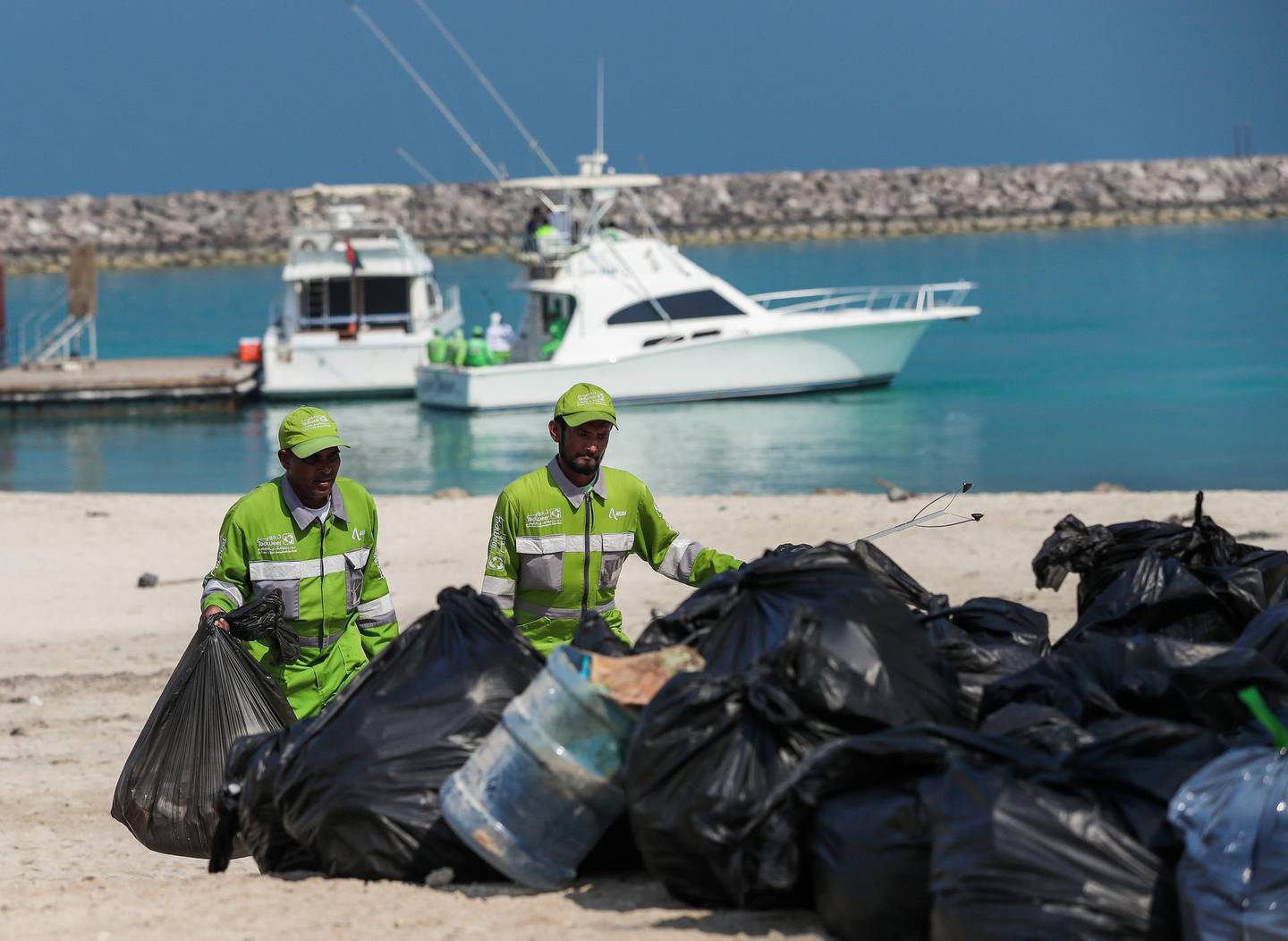 Abu Dhabi, March 23, 2018.  Beach clean up at Lulu Island by volunteers.  Workers help clean up the beach.Victor Besa / The NationalNationalReporter:  Nick Webster