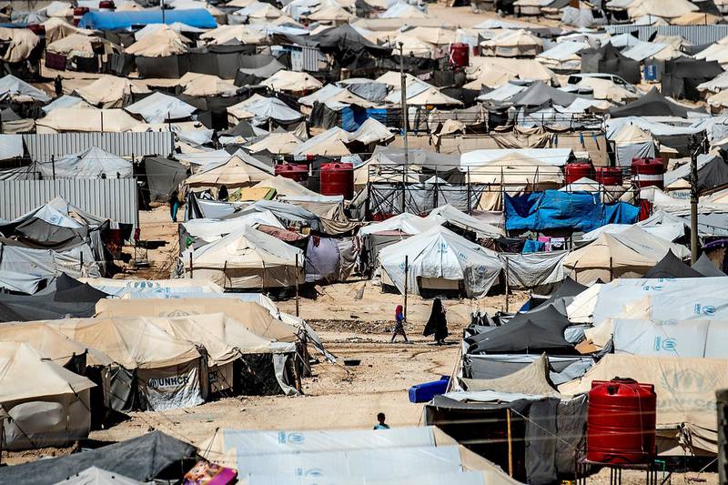 This picture shows a general view of the al-Hol camp in al-Hasakeh governorate in northeastern Syria, on August 08, 2019. - Months after the defeat of the jihadist proto-state, families of IS fighters are among 70,000 people crammed into the Kurdish-run Al-Hol camp in northeastern Syria. (Photo by Delil SOULEIMAN / AFP)