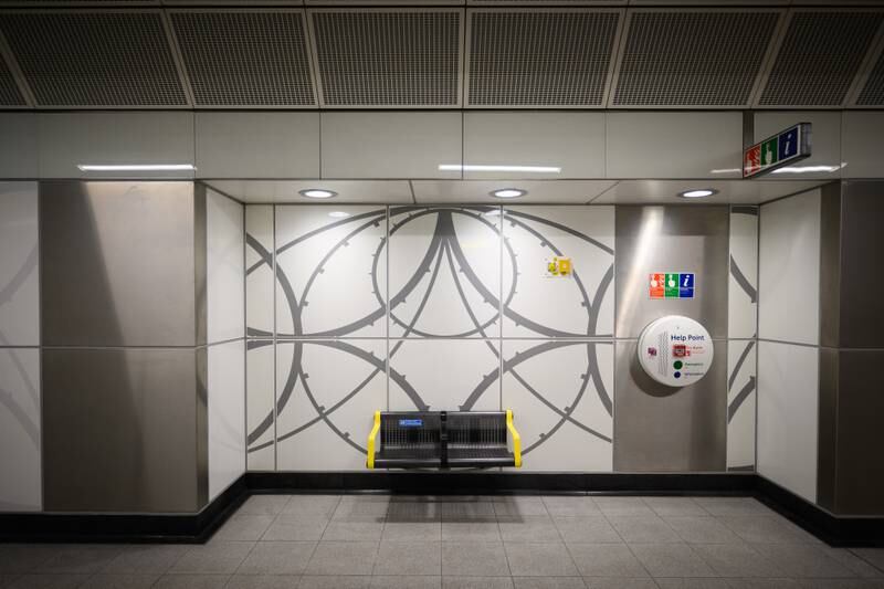 Decorative tiles inspired by 19th-century civil engineer Isambard Kingdom Brunel in a corridor leading to the Elizabeth line at Paddington Station. Getty Images