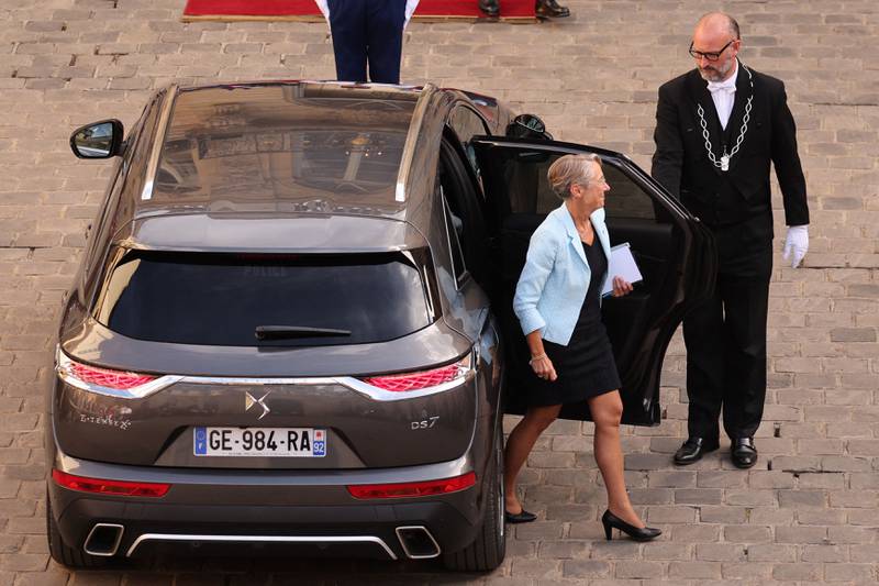 Ms Borne arrives at the Hotel Matignon. AFP
