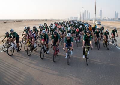 The future of cycling in Al Hudayriat Island, Abu Dhabi, is commemorated by a community ride around the track. Victor Besa / The National