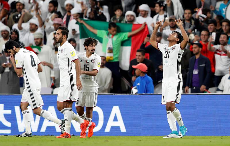 Al Jazira’s Romarinho celebrates scoring their first goal with teammates. Reuters