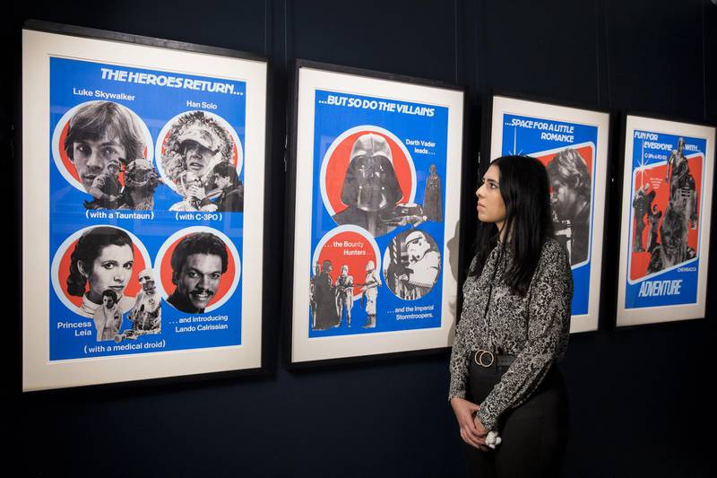 Star Wars posters ranging from £100 to £24,000 go on view at Sotheby's in London, England. Highlights from Sotheby's Star Wars Online sale are on view until 11 December, featuring posters, toys and props from the original trilogy. Getty Images