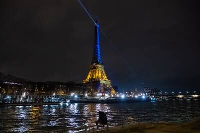 The Eiffel Tower in Paris is lit up in the colours of Ukrainian flag. EPA