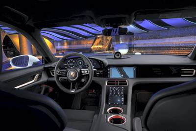 The cockpit features a free-standing curved instrument cluster and central, 10.9-inch infotainment display and an optional passenger display combined to form an integrated glass band 