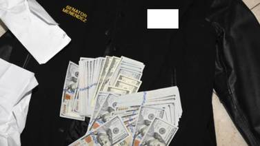 A jacket bearing Bob Menendez's name that was purportedly found with cash in envelopes as federal agents investigated an alleged bribery scheme. US Attorney's Office / AP