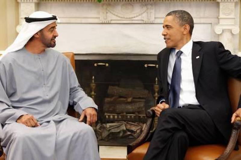 U.S. President Barack Obama (R) holds a meeting with Crown Prince Mohammed bin Zayed Al Nahyan of the United Arab Emirates in the Oval Office of the White House in Washington April 26, 2011.  
REUTERS/Kevin Lamarque (UNITED STATES - Tags: POLITICS ROYALS) *** Local Caption ***  WASW201_OBAMA-UAE_0426_11.JPG