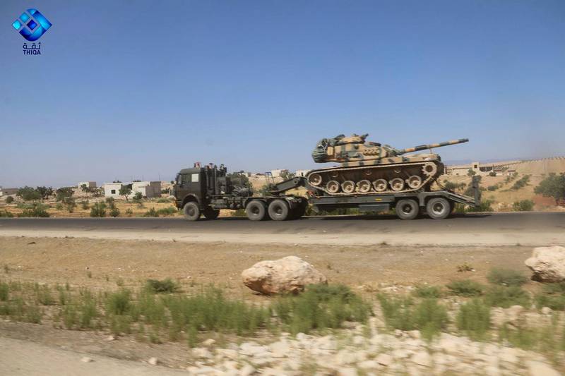 Part of a Turkish military convoy heading toward the town of Khan Sheikhoun on Monday. AP