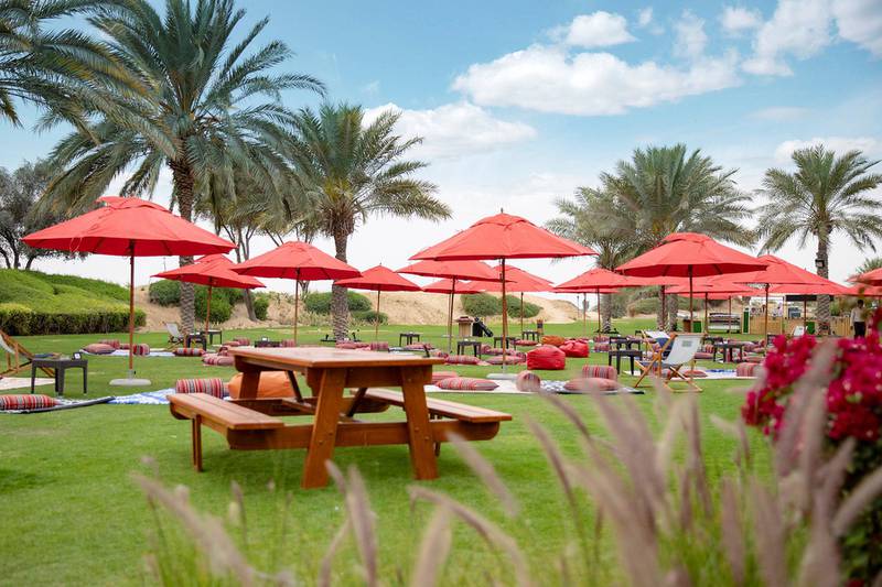 Lounge about on picnic benches and blankets at the Bab Al Shams outdoor weekend brunch