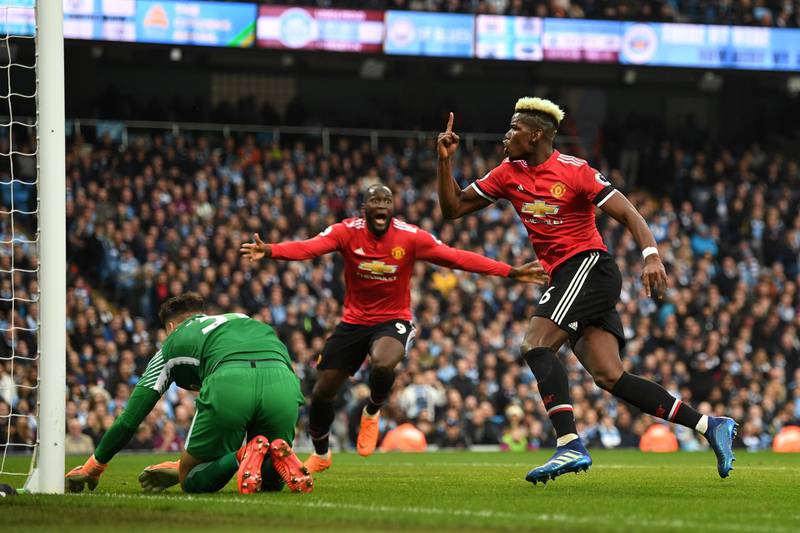 MANCHESTER, ENGLAND - APRIL 07:  Paul Pogba of Manchester United celebrates after scoring his sides second goal during the Premier League match between Manchester City and Manchester United at Etihad Stadium on April 7, 2018 in Manchester, England.  (Photo by Michael Regan/Getty Images)