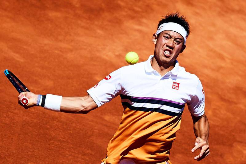 epaselect epa07530272 Kei Nishikori of Japan in action against Roberto Carballes Baena of Spain during their quarter final match of the 67th Barcelona Open Trofeo Conde de Godo tennis tournament in Barcelona, northeastern Spain, 26 April 2019.  EPA/ALEJANDRO GARCIA