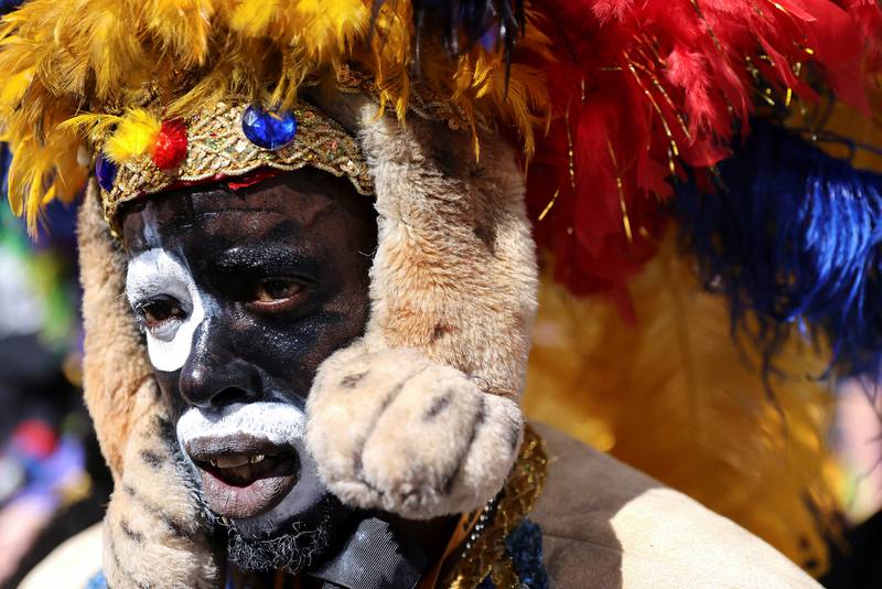 A member of the Zulu Social Aid & Pleasure Club parades down St Charles Avenue during Mardi Gras in New Orleans. Reuters