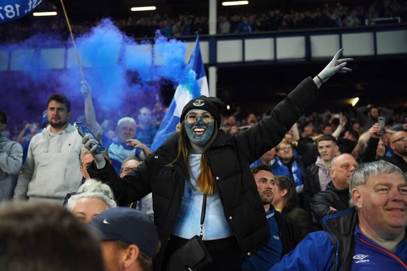 Everton fans celebrate following the win. Getty