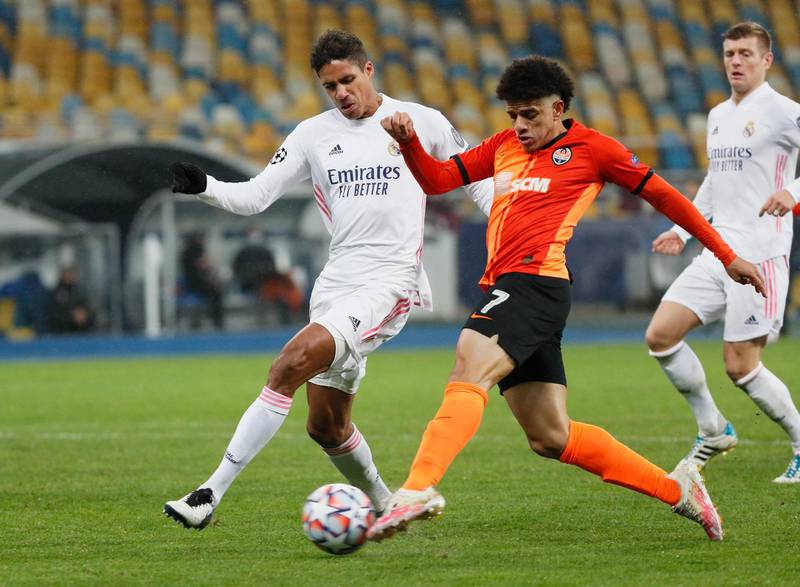 Shakhtar Donetsk's Taison takes on Real Madrid defender Raphael Varane. Reuters