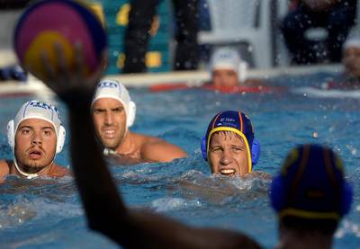 Nicholas Presciutti, left, and Balazs Sziranyi, right, are seen during their men’s Vodafone Cup international water-polo match in Budapest, Hungary, Tamas Kovacs / Reuters / July 9, 2015