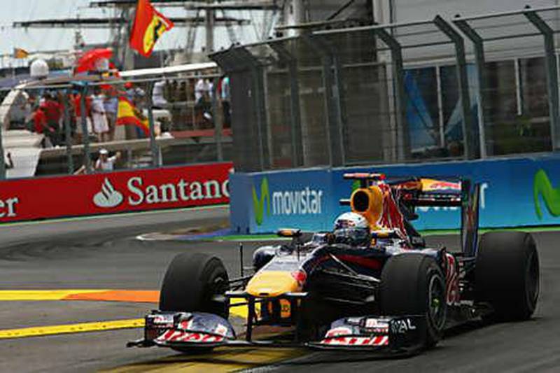 Sebastian Vettel in action in Valencia yesterday in his Red Bull-Renault on the way to victory in the European Grand Prix.