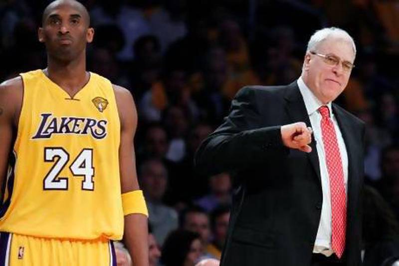 Though he backed away from comparing Kobe Bryant, left, to Michael Jordan in a previous book, Phil Jackson, right, addressed the subject in his latest tome.