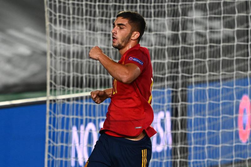 Spain's midfielder Ferran Torres celebrates after scoring a goal during the UEFA Nations League A group 4 football match between Spain and Ukraine at the Alfredo Di Stefano Stadium in Madrid on September 6, 2020. / AFP / GABRIEL BOUYS
