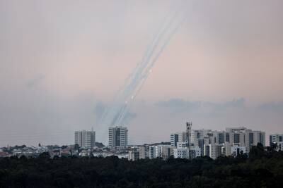 Rockets are launched from the Gaza Strip towards Israel, as seen from the Israeli side of the border, on October 9. Reuters
