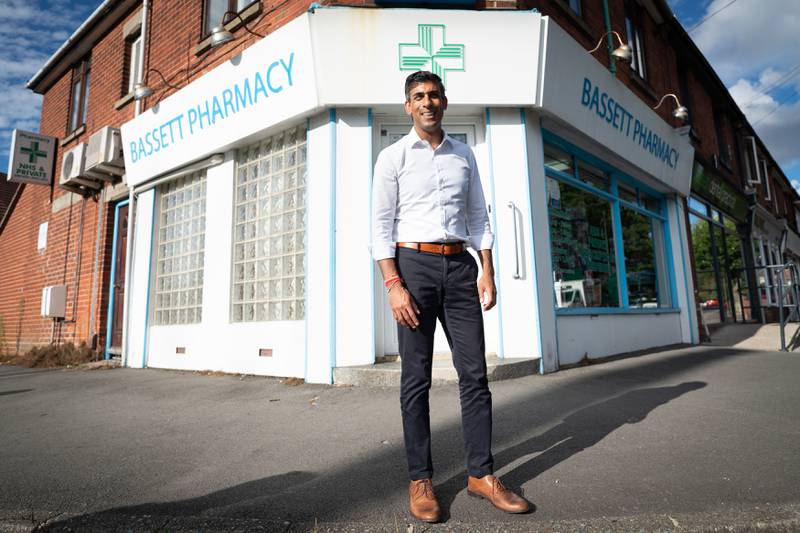 Rishi Sunak was born in Southampton on the south coast of England. Here he is pictured visiting his family's old business, Bassett Pharmacy, in Southampton, during his campaign to be leader of the Conservative Party in August. PA