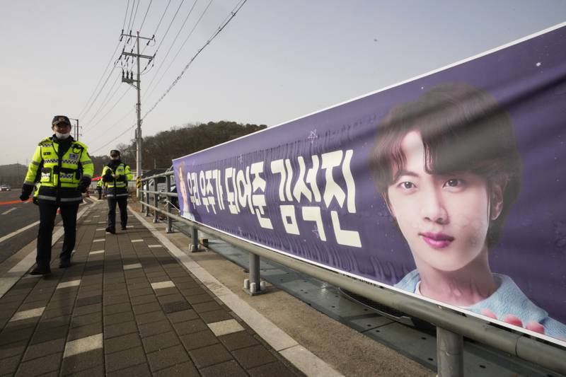 A banner bearing Jin's picture near an army training centre in Yeoncheon. AP