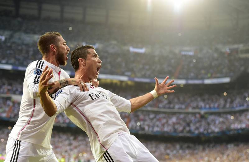 Cristiano Ronaldo celebrates with Sergio Ramos after scoring for Real Madrid during the Champions League semi-final second-leg at home to Juventus on May 13, 2015. AFP