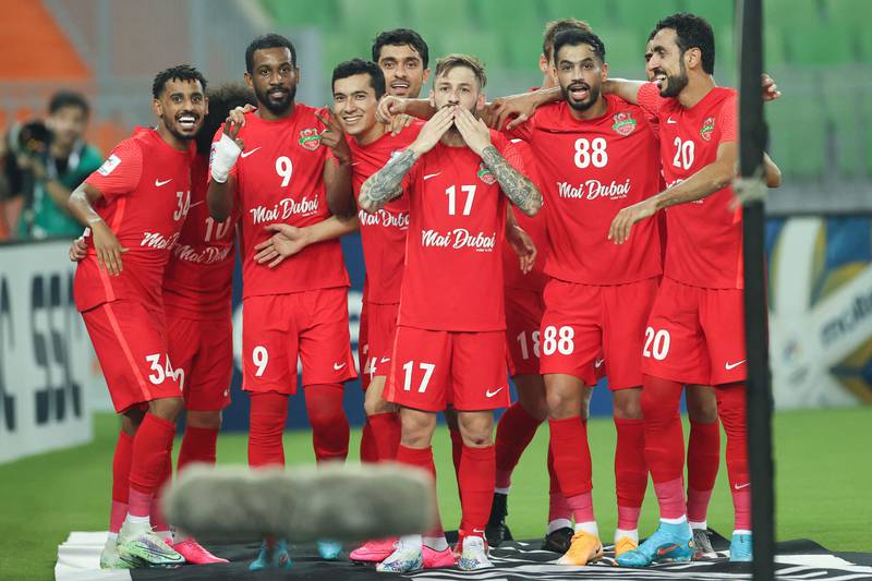 Shabab Al Ahli midfielder Federico Cartabia, centre, celebrates with teammates after scoring the fifth goal during the Asian Champions League Group C match against Al Gharafa at the Prince Abdullah al-Faisal Stadium in Jeddah. AFP