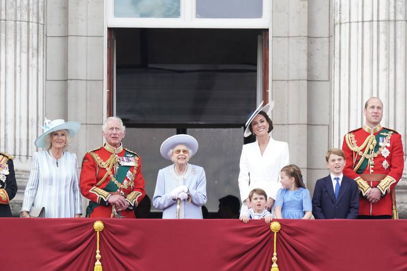From left, the Duchess of Cornwall, the Prince of Wales , Queen Elizabeth II , the Duchess of Cambridge, Prince Louis, Princess Charlotte, Prince George, and the Duke of Cambridge, on the balcony of Buckingham Palace to view the RAF flypast on day one of the platinum jubilee celebrations. PA