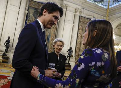 Canada's Prime Minister Justin Trudeau and European Commission President Ursula von der Leyen attend a reception at the Royal Palace in Madrid. AP