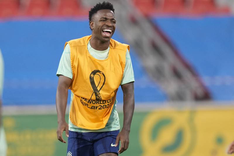 Vinicius Junior smiles during a training session at the Grand Hamad Stadium. AP
