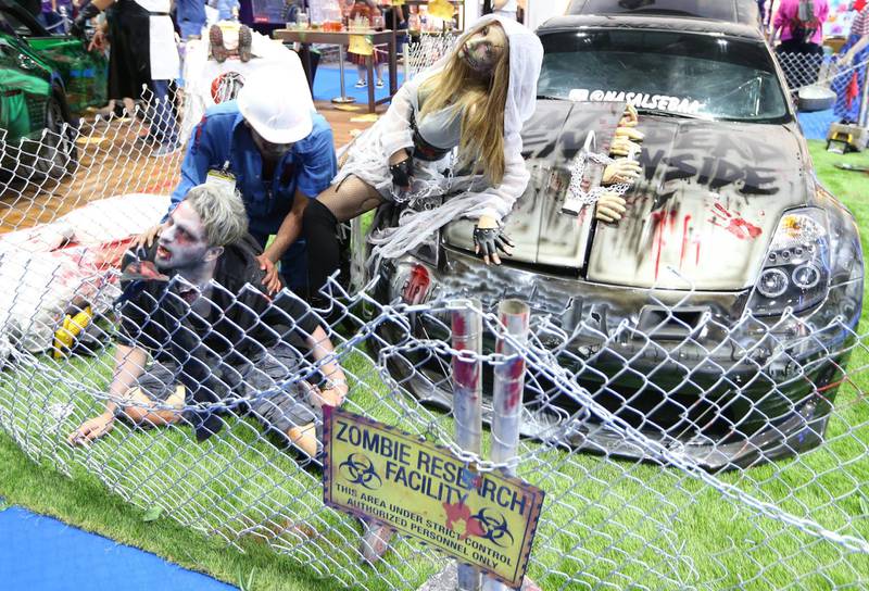Guests in zombie costumes attend the Middle East Film and Comic Con. EPA