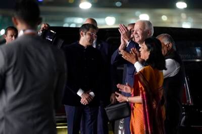 US President Joe Biden smiles after arriving at Indira Gandhi International Airport to attend the G20 summit in New Delhi.  AP Photo