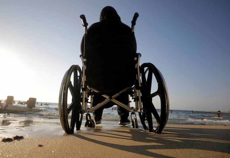 A woman in a wheelchair at the first public beach in Alexandria, Egypt, for people with disabilities.