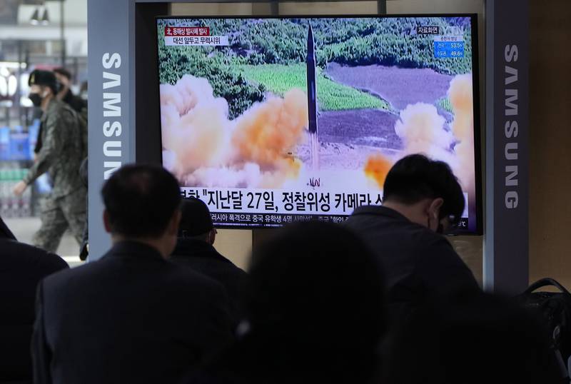 A TV at Seoul Railway Station, South Korea, shows a file image of North Korea's missile launch on March 5.  AP
