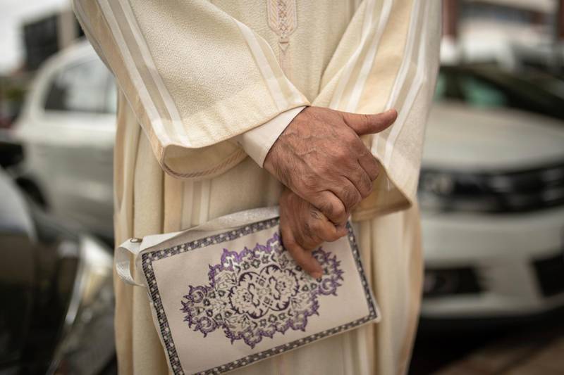 A Muslim worshipper waits to enter a mosque for Friday prayers in Rabat, Morocco. AP Photo